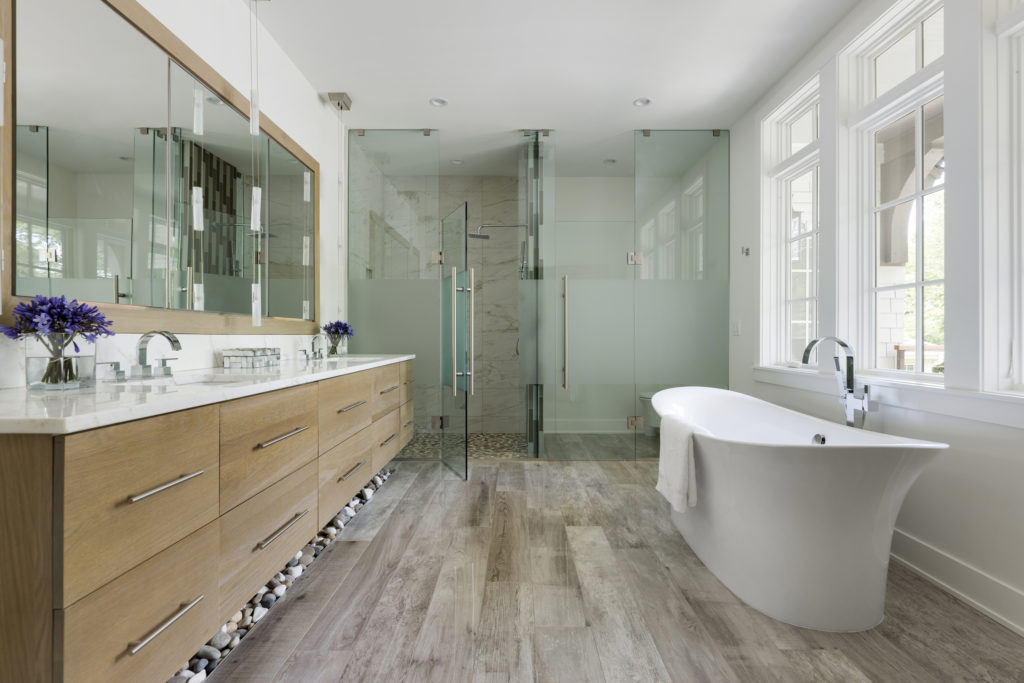 elegant bathroom. Learn about smart home technology that can enhance your experience in your custom master bathroom.