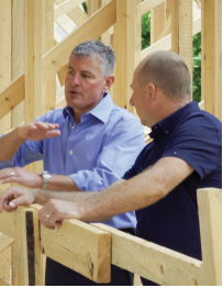 Todd speaking with a client about custom home construction